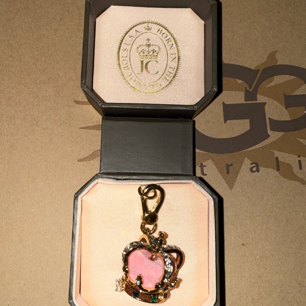Juicy Couture Pink and gold charm
